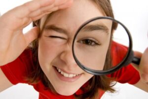 girl-magnifying-glass